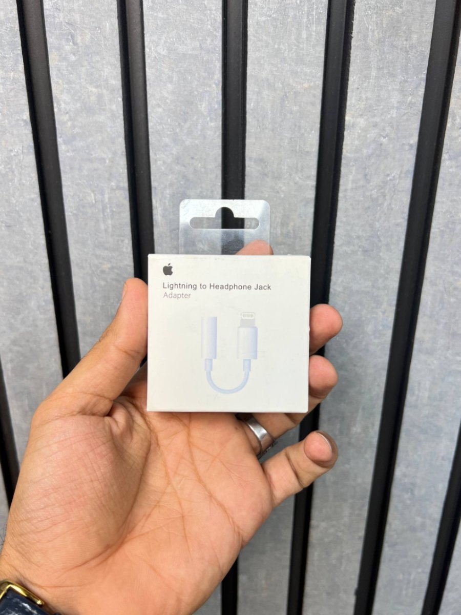 خرید تبدیل لایتنینگ به جک 3.5 میلی متری صدا اصلی اپل مدل Lightning to Headphone Jack Adapter (اورجینال / ضمانت اصالت رنجو موبایل) - محصولات آیفون